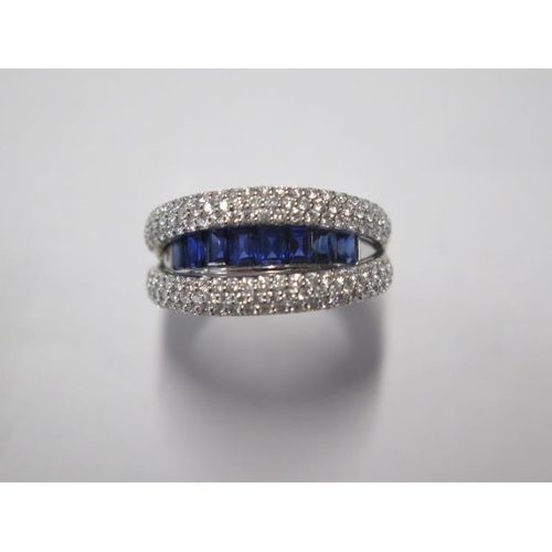 63 - An unusual 18ct white gold hinged diamond and sapphire ring approx 125 diamonds and 8 sapphires, rin... 