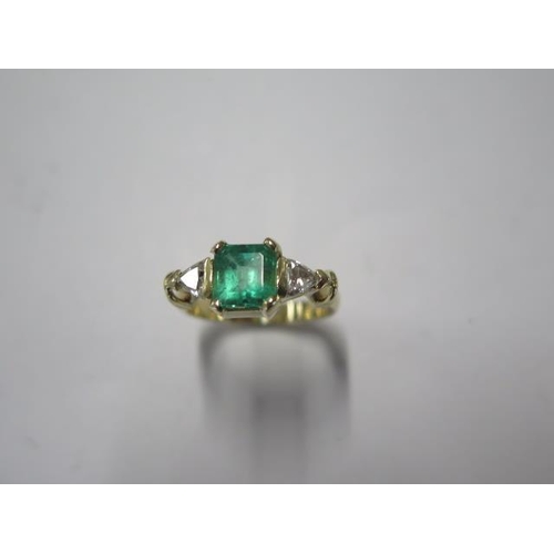 72 - An 18ct yellow gold emerald and trillion cut diamond ring - emerald approx 1.5ct, emerald is a good ... 