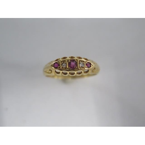 73 - An 18ct yellow gold diamond and ruby ring size L/M - approx weight 2.3 grams