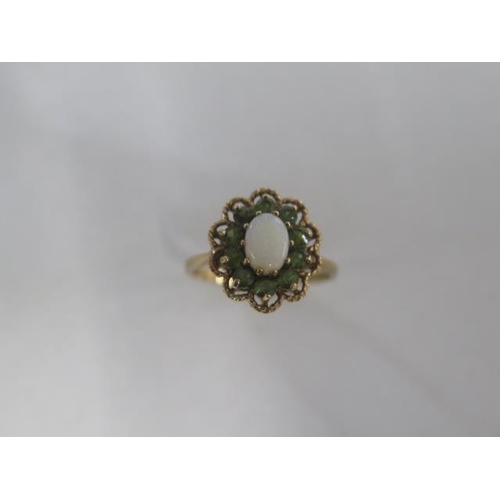 75 - A 9ct yellow gold opal cluster ring size N/O - approx weight 2.8 grams - good condition