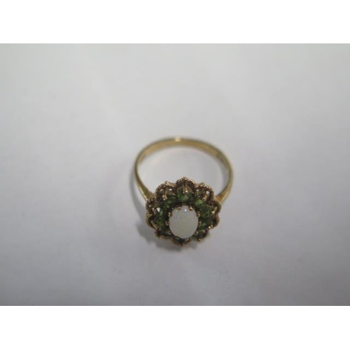 75 - A 9ct yellow gold opal cluster ring size N/O - approx weight 2.8 grams - good condition