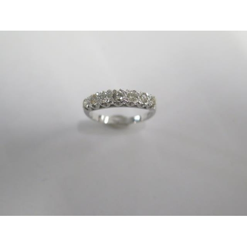 78 - An 18ct white gold seven stone diamond ring size Q - approx weight 3.2 grams - diamond bright and li... 