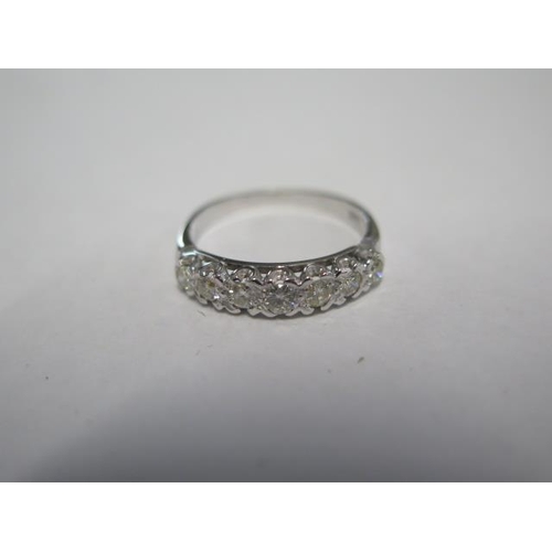 78 - An 18ct white gold seven stone diamond ring size Q - approx weight 3.2 grams - diamond bright and li... 