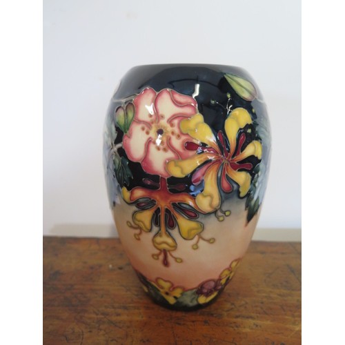 233F - A Moorcroft green initialled vase - Height 18cm - good condition