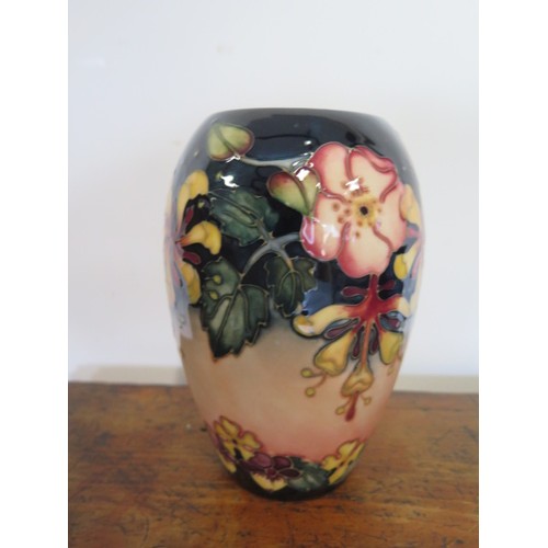 233F - A Moorcroft green initialled vase - Height 18cm - good condition