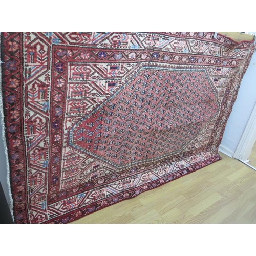 304 - A hand knotted woollen Araak rug - 2.05m x 1.22m