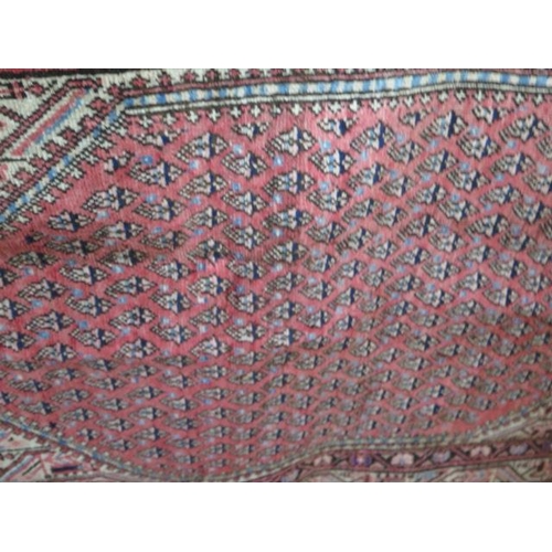 305 - A hand knotted woollen Araak rug - 1.98m x 1.26m