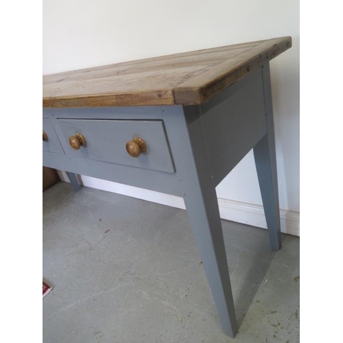 231 - A painted pine three drawer kitchen/studio serving work table with a waxed pine top - Height 86cm x ... 