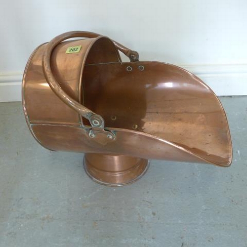 202 - A copper helmet coal scuttle