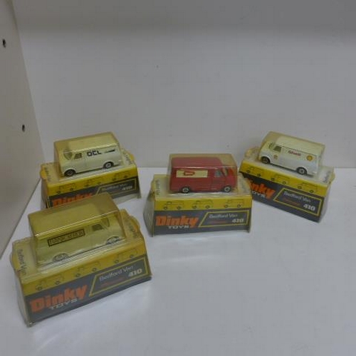 31 - Four Dinky boxed Bedford vans 410 - plastic covers worn/split otherwise generally good