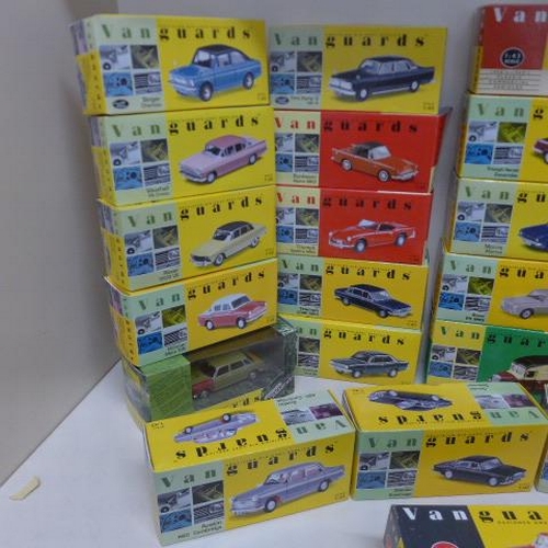 59 - A collection of 29 boxed Vanguard cars and vans all good condition