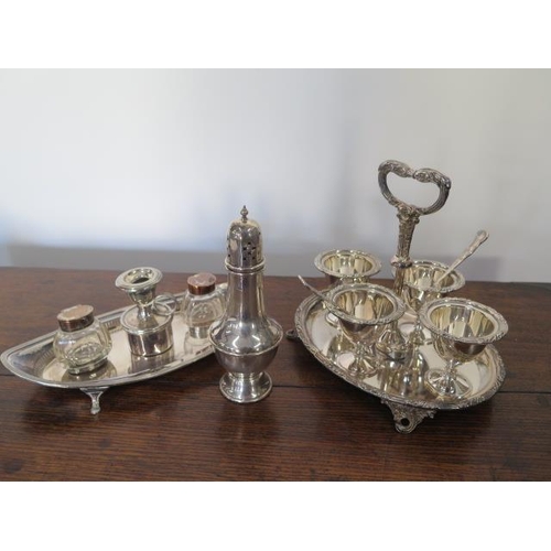  A silver sifter 15.5cm tall - approx weight 2 troy oz, a plated egg cup set and a plated desk set - ... 
