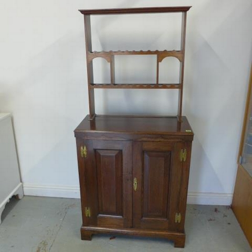 527 - An oak two door panelled cupboard with an open rack top, nice polished colour - Height 166cm x 77cm ... 