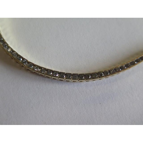 108 - A 14ct yellow gold diamond tennis bracelet - Length 18.5cm - approx weight 9.6 grams - good conditio... 