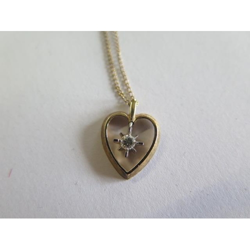 112 - A 14ct gold diamond heart pendant on 14ct chain (pendant 13mm wide) and a 14ct yellow gold 17cm brac... 