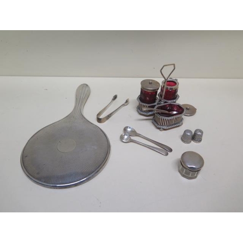 161 - A silver and ruby glass cruet set, top loose to mustard and two spoons are plated but glass good - a... 
