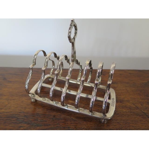 165 - A silver toast rack London 1906/07 GS Co Ltd - Length 13.5cm - approx weight 7.7 troy oz - in good c... 