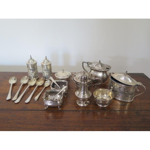 166 - An assortment of silver mustard, peppers and salts and spoons - total weighable silver approx 14 tro... 