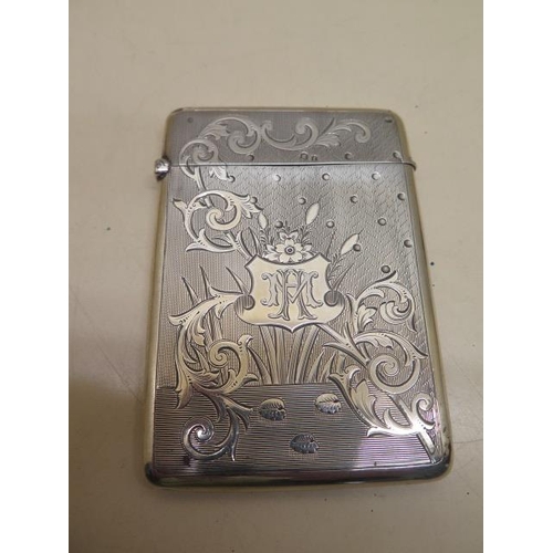 177 - A silver card case - 10cm x 7cm - approx 2 troy oz - slight bending but generally good