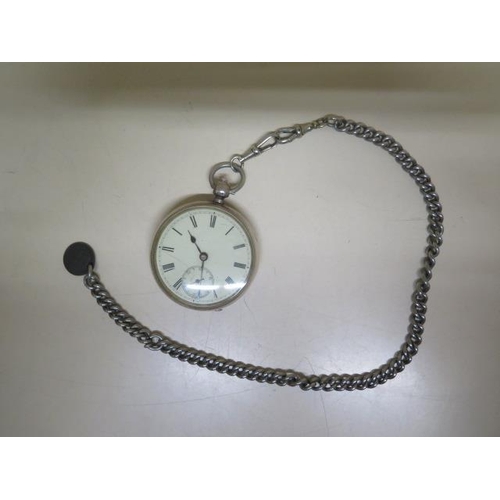 205 - A silver key wind pocket watch with chain - crack to dial but running - 50mm case - with key