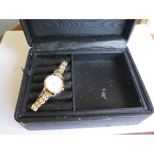 213 - A 9ct yellow gold Bueche Girod ladies quartz watch - 23mm case - on a plated bracelet strap - not cu... 