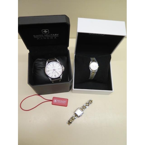 222 - A Hanowa Swiss Military quartz gents wristwatch - 40mm case and a Seiko ladies quartz bi metal brace... 