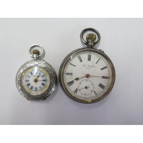 228 - A silver Fattorini ladies pocket watch - running, and a 'The Bedford' silver pocket watch - 50mm cas... 