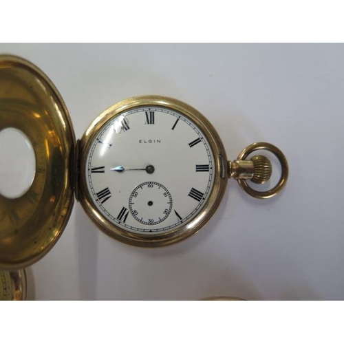 239 - An Elgin half hunter gold plated pocket watch, another similar half hunter and an open face plated w... 