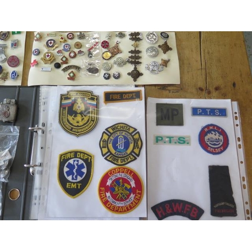 286 - A group of Red Cross and Medical badges and Fire Service badges including a Holland and Wolf Fire Br... 