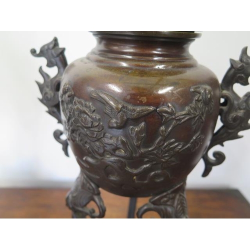 295 - A pair of Oriental bronze lidded censors on stands - Height 41cm - both with good patina