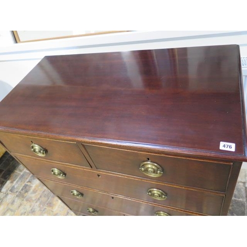 476 - An early 19th century mahogany chest with two short over three long drawers on splayed bracket feet ... 