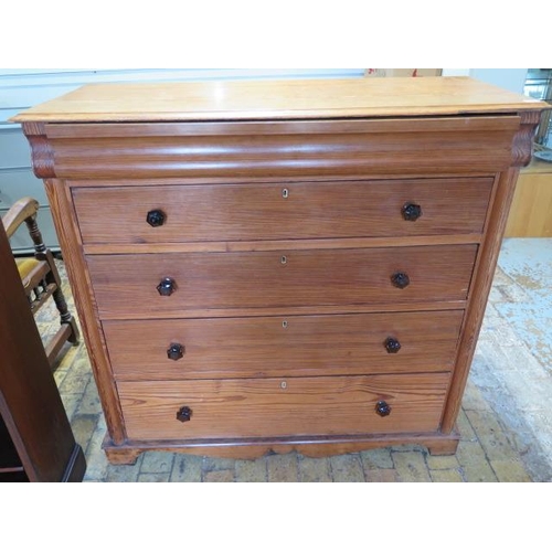 477 - A 19th century pitch pine chest with a top secret drawer over four drawers