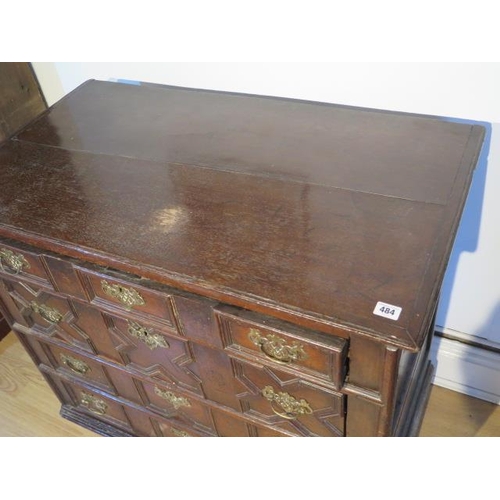 484 - An 18th century oak chest with four geometric drawers raised on bun feet - Width 96cm x Depth 55cm x... 