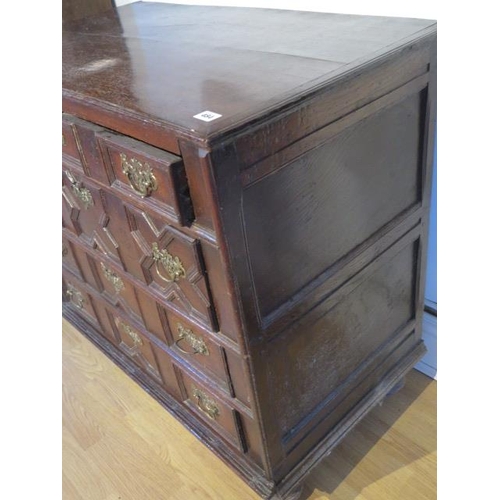 484 - An 18th century oak chest with four geometric drawers raised on bun feet - Width 96cm x Depth 55cm x... 