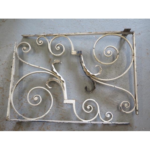 503 - A pair of decorative scroll wrought iron brackets - 68cm x 48cm