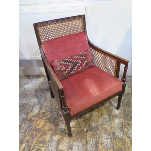 528 - An early 1900's mahogany Bergère armchair - Height 86cm x Width 59cm - with drop in upholstered seat... 