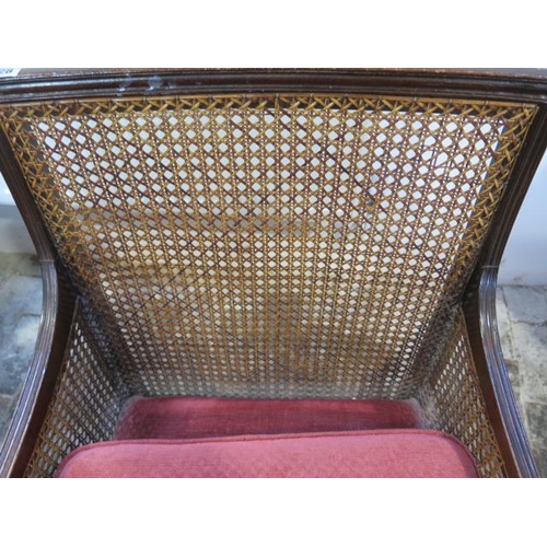 528 - An early 1900's mahogany Bergère armchair - Height 86cm x Width 59cm - with drop in upholstered seat... 