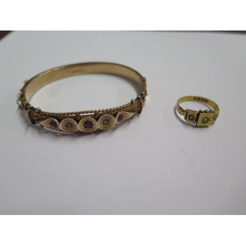 54 - A 9ct hallmarked yellow gold bangle - 6.5cm x 5.5cm external - approx weight 12 grams and a similar ... 