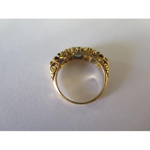 55 - A hallmarked 18ct yellow gold sapphire and diamond ring size M - approx weight 4.7 grams - generally... 