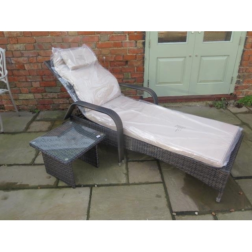 555 - A new Maze Rattan Florida sun lounger with a drinks table - cheapest internet prince £279