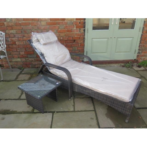 556 - A new Maze Rattan Florida sun lounger with a drinks table - cheapest internet prince £279 - boxed