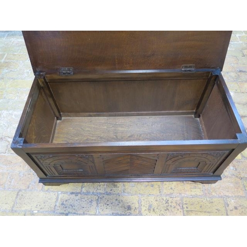 565 - A 20th century oak coffer/blanket box - Height 46cm x 100cm x 50cm - in polished condition