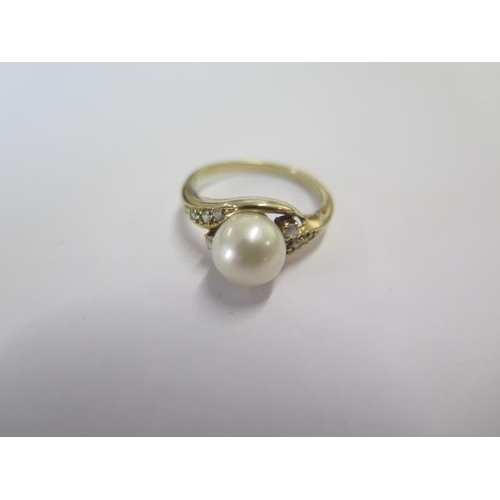67 - A 585 14ct yellow gold pearl ring size N - approx weight 3.2 grams - generally good, minor marks to ... 