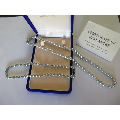 68 - Two strings of Victors cultured pearls - 43cm and 57cm - with silver clasps, 6mm and 7mm diameter - ... 