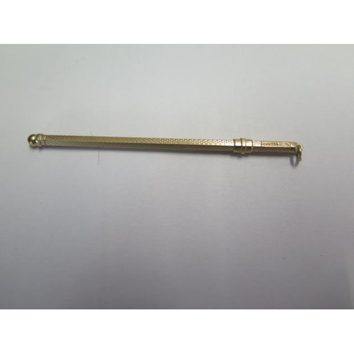 73 - A hallmarked 9ct yellow gold swizzle stick - Length 9cm closed - approx weight 5.8 grams - slight be... 