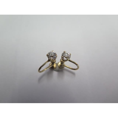 76 - A pair of diamond 9ct yellow gold screw back earrings - diamond weight approx 0.35ct - diamonds brig... 