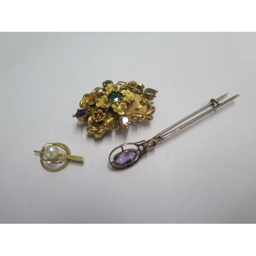 77 - A 9ct yellow gold pin brooch and two gilt metal brooches - one missing a flower - total weight appro... 