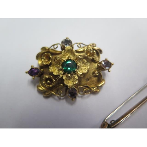 77 - A 9ct yellow gold pin brooch and two gilt metal brooches - one missing a flower - total weight appro... 