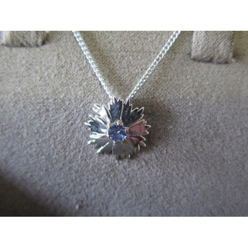 79 - A Clogau silver snowflake pendant and a Clogau silver cornflower pendant - ex jewellers stock - as n... 