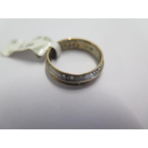 82 - A 9ct two colour 24 diamond ring size M - ex jewellers stock - as new condition - RRP £599